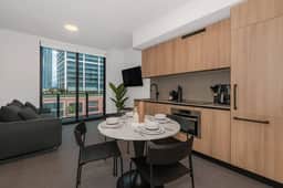 Skyline Retreat 1BR+Den | Walkable Downtown + Pool